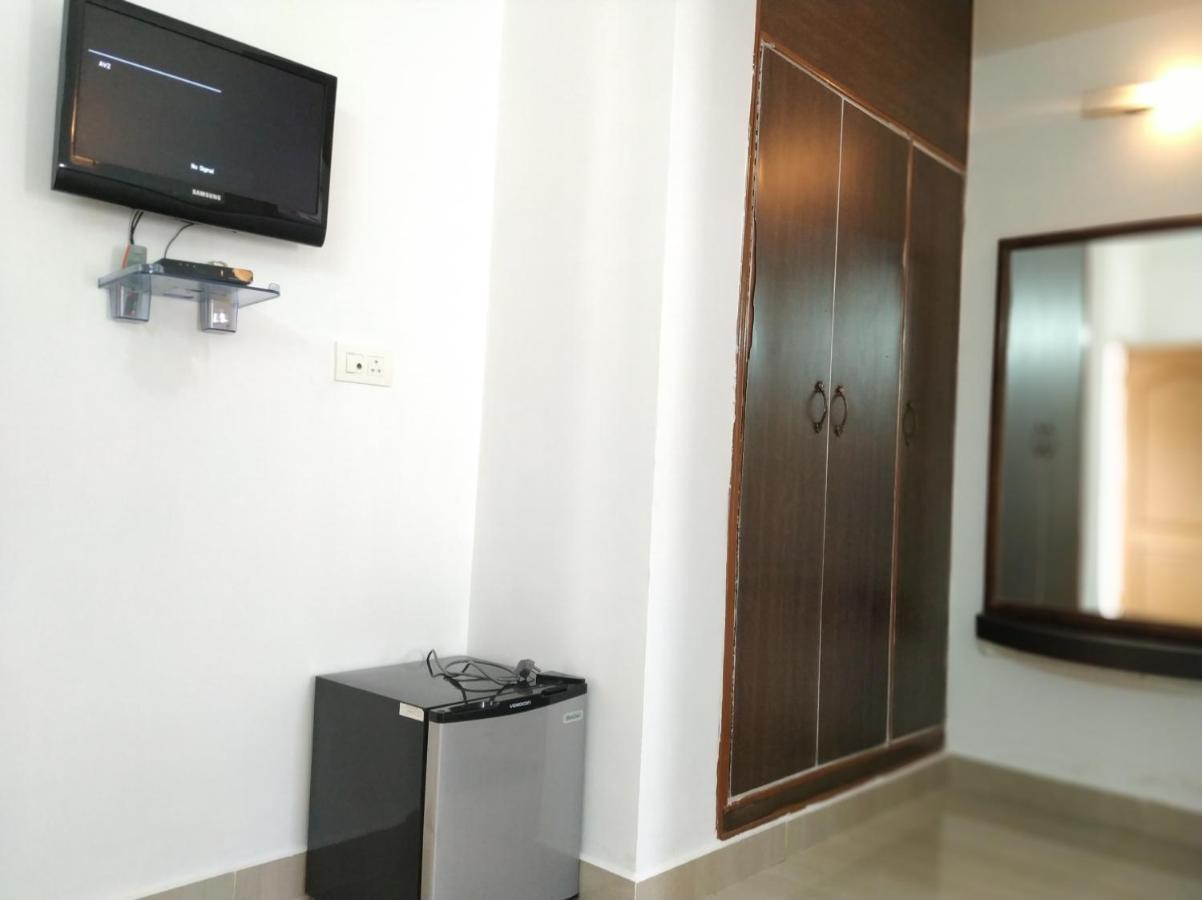Aum Hotel ปุตตาปาร์ถี ภายนอก รูปภาพ