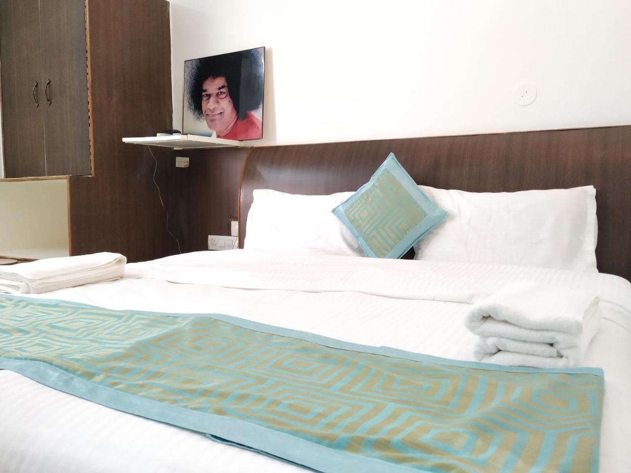 Aum Hotel ปุตตาปาร์ถี ภายนอก รูปภาพ