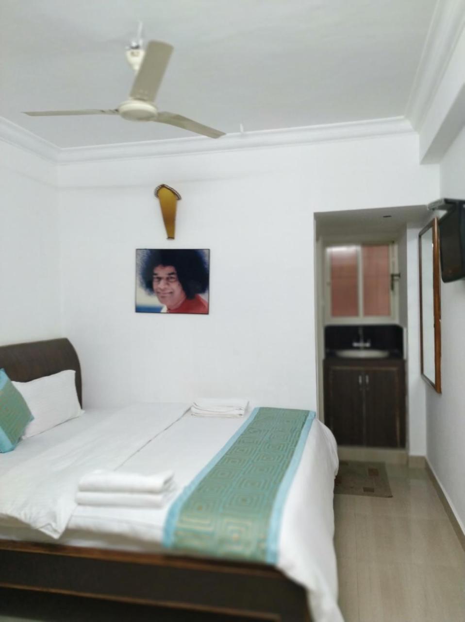 Aum Hotel ปุตตาปาร์ถี ภายนอก รูปภาพ